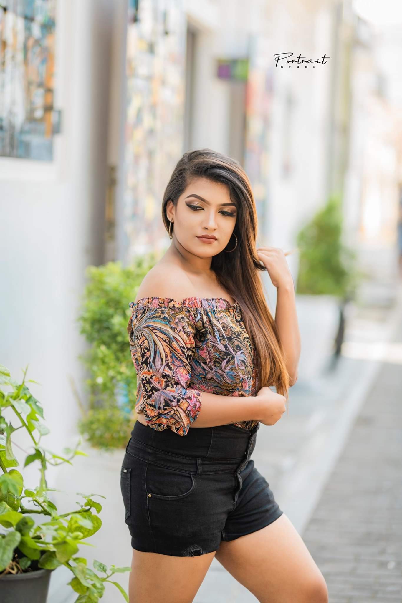 Sri Lankan Model Shehani looks stylish in top and black shorts